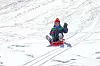 boy sledding